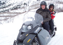 John Limper and daughter Mikaela snowmobile in Park City // (c) John Limper