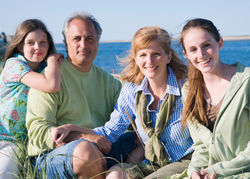 A family vacation to the beach is an economical choice. // (c) Photos.com
