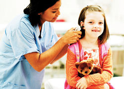 With more families traveling to exotic locales, medical concerns need to be considered. // (c) Photos.com