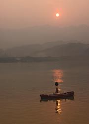 The Three Gorges Dam project has increased visitor access to the ancient cities surrounding the Yangtze River. // (C) 2010 Ray Devlin