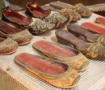 A collection of Abdul’s mother’s shoes is on display at the house. // © 2010 Deanna Ting_small