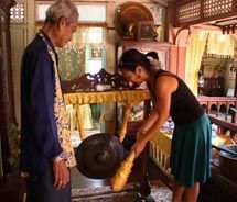 Christina beats the gong to make her wish come true. // © 2010 Deanna Ting_small