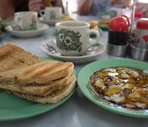Ya Kun Kaya Toast serves up an authentically Singaporean breakfast of kaya toast, soft-boiled eggs and coffee. // © 2011 Deanna Ting