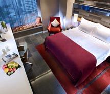 A guestroom at the Quincy // © 2010 Quincy Hotel/Far East Organization