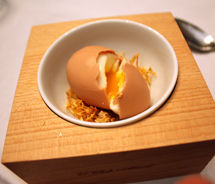 Diners were puzzled when waiters brought out a hardboiled egg for dessert at Madrid’s Michelin rated El Club Allard. // © 2011 Mindy Poder
