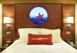 Inside staterooms on the Disney Dream will feature Virtual Portholes that mix Disney characters with a real-time view outside the ship. // © Disney Cruise Line