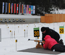 Managing Editor, Janeen Christoff, takes a shot at Biathlon. // © 2011 Janeen Christoff Managing Editor, Janeen Christoff, takes a shot at Biathlon. // © 2011 Janeen Christoff