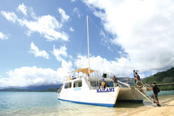 As part of Travel Pink, Travel Oahu clients can enjoy a catamaran ride at Kualoa Ranch. // (c) Kualoa Ranch