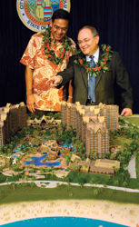 Walt Disney Parks & Resorts chairman Jay Rasulo (right) shared plans for its future resort in Hawaii with Honolulu mayor Mufi Hannemann. // (c) Walt Disney Parks & Resorts