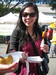 Candice tries kimchee sausage while Rebecca offers her some fried green tomatoes. // © Deanna Ting 2010
