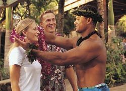 Guests are greeted with leis at the Alii Luau. // (C) 2010 Alii Luau