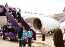 Hawaiian Airlines lands its new Airbus A330 at Honolulu International Airport. // © 2010 Dana Edmunds