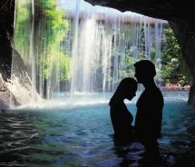Couple in cave with waterfall, Hyatt Regency Maui. // © 2011 Hyatt Regency Maui Couple in cave with waterfall, Hyatt Regency Maui. // © 2011 Hyatt Regency Maui