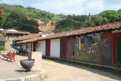 The mural in Copala’s town square depicts the market that once took place there. // (c) Heather Burgett