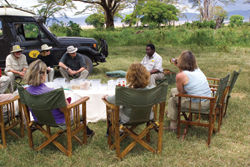Clients picnic in the bush with A&K. // (c) Abercrombie & Kent