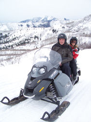 John Limper and daughter Mikaela snowmobile in Park City, Utah. // (c) John Limper