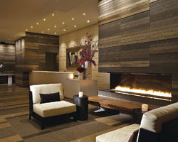 The hotel’s lobby has a modern ambiance warmed by Pacific Northwest materials. // (c) Four Seasons Hotel Seattle