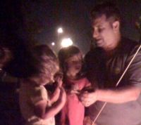 Enjoying s'mores at the Hilton Waterfront Beach Resort in Huntington Beach, Calif