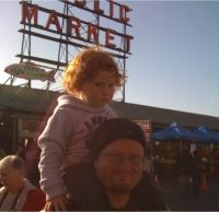 Ava and her dad take in the Pike Street Market // (c) 2009