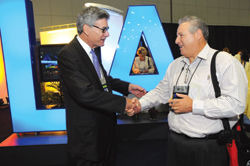 Mark Liberman, president and CEO of LA Inc., The Los Angeles Convention and Visitors Bureau (left), greets John Sorci, Jr., vice president of Global Operations for Symantec Corporation, at the LA Inc.