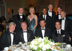 Jimmy Murphy (seated left), of Brendan Worldwide Vacations, hosted a table at the WAVE Awards Gala dinner that included several of this year’s Trendsetters.