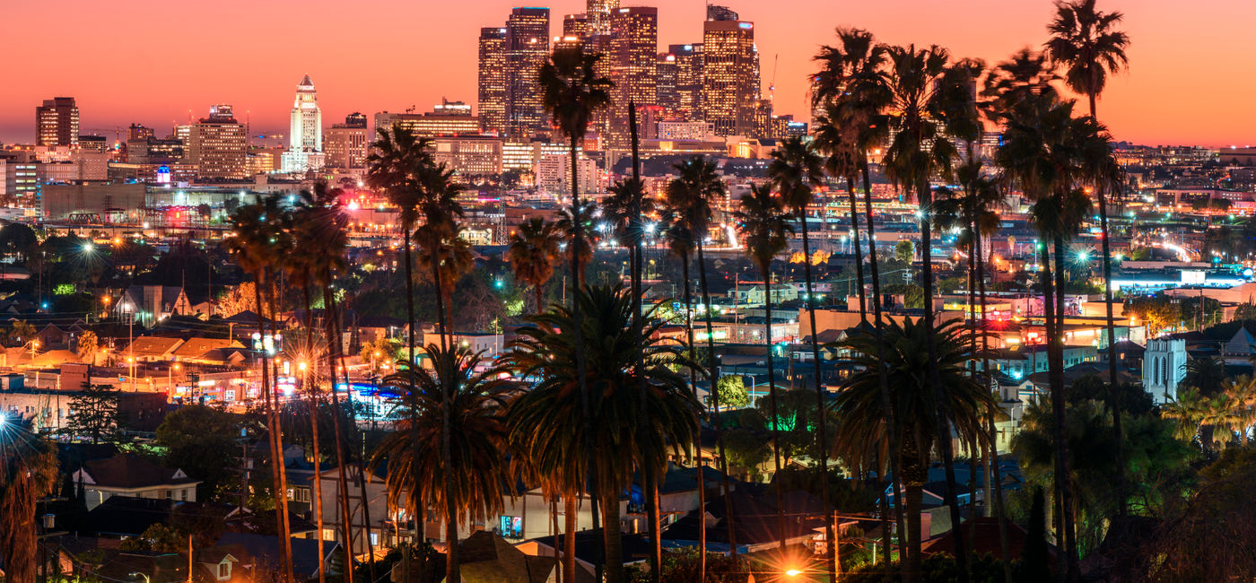Image: Beautiful sunset behind Los Angeles' downtown skyline. (photo via choness/iStock/Getty Images Plus) (choness / iStock / Getty Images Plus)