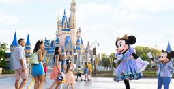 Minnie and Mickey greet park guests at Walt Disney World.