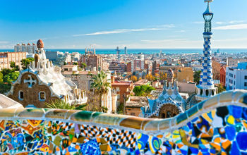 A colorful tiled rooftops of Park Güell, Barcelona, Spain