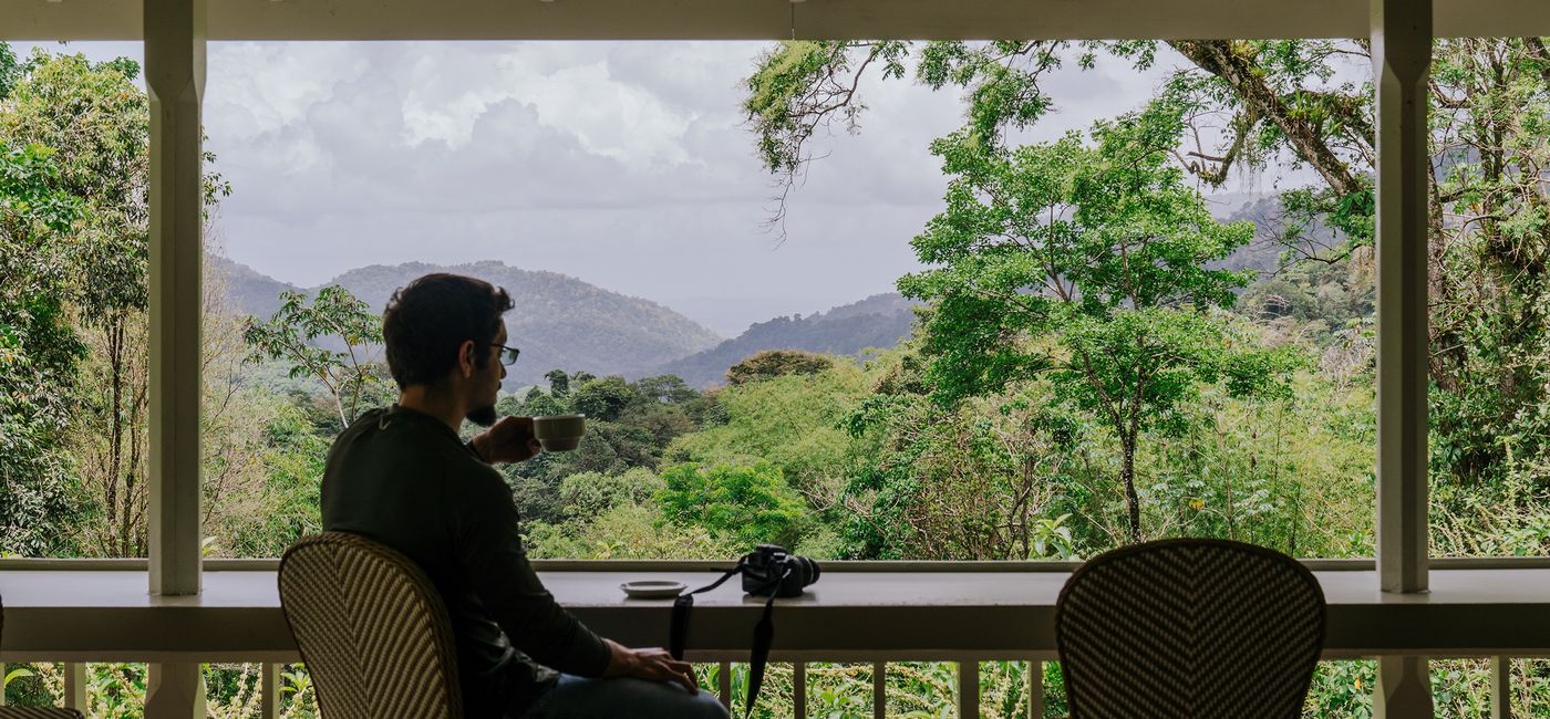 Image: Birdwatcher at the Asa Wright Nature Center. (Photo Credit: Jake Naughton, HADCO Experiences)