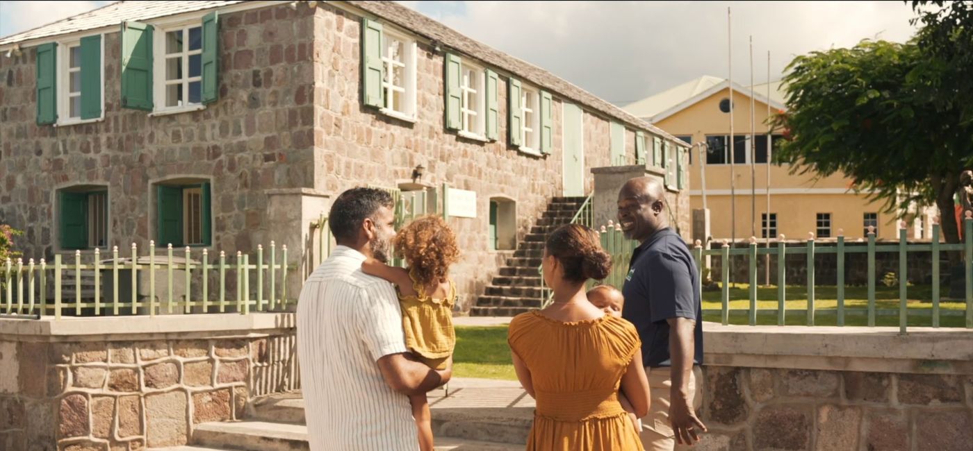 Image: “Our brand of hospitality emphasizes authentic dialogue, community involvement, and storytelling.” - Greg Phillip (right), CEO of Nevis Sun Tours. (Photo courtesy of Nevis Sun Tours)