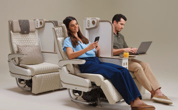 Emirates upgraded premium economy seat with privacy divider