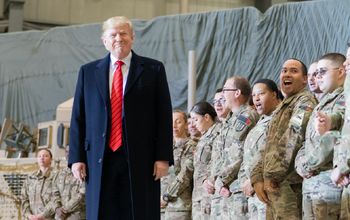 President Trump visiting with the troops in Afghanistan