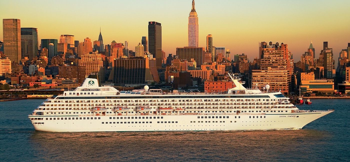Image: Crystal Symphony sailing out of New York City. (photo via of Crystal Cruises)