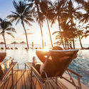 Sitting poolside on a luxury vacation