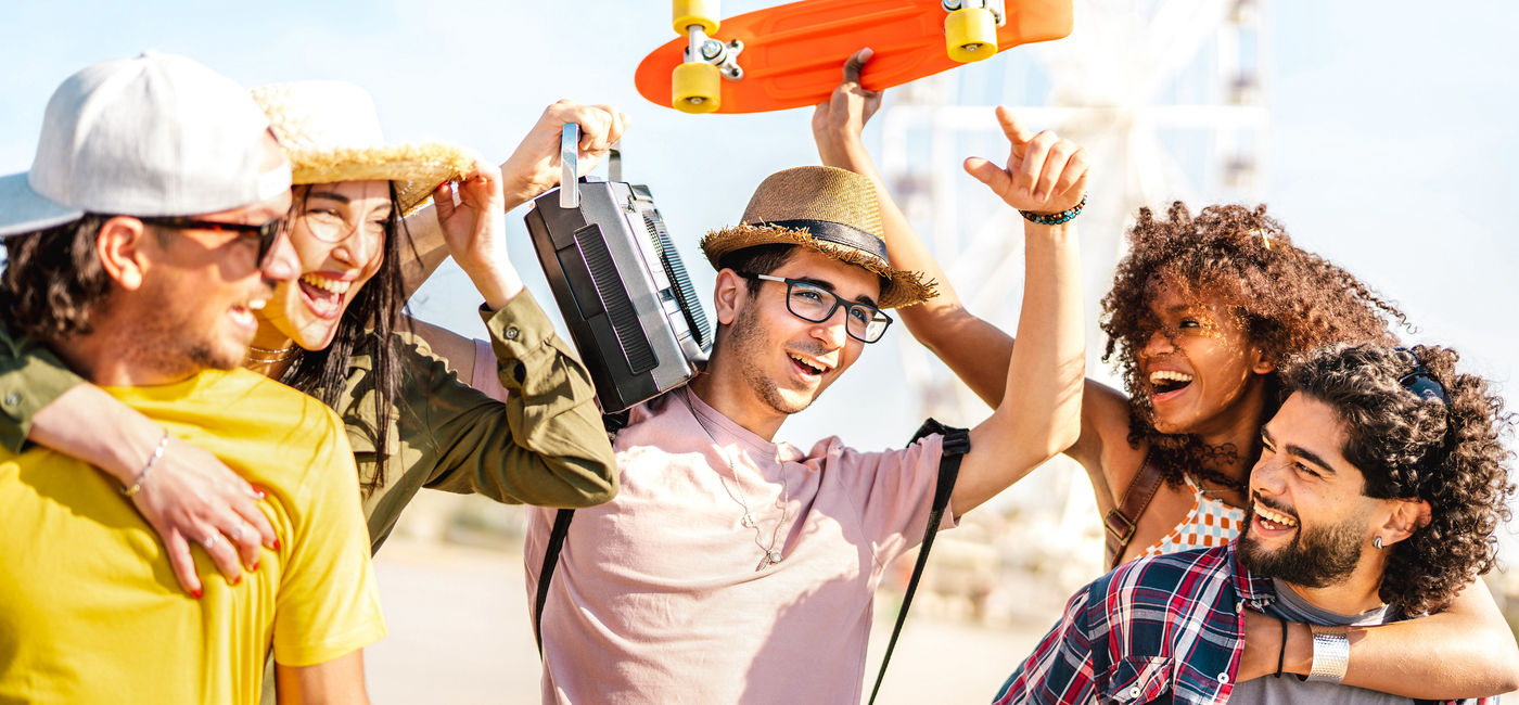 Image: Friends having fun on spring break.  (Photo Credit: Adobe Stock/Mirko Vitale)