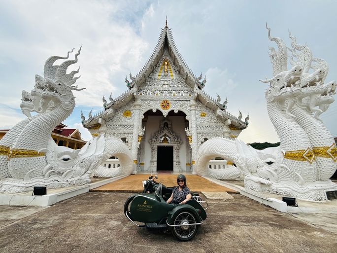 A ride in Anantara Golden Triangle’s Royal Enfield motorcycle sidebar whisks guests past area attractions, including stunning temples.
