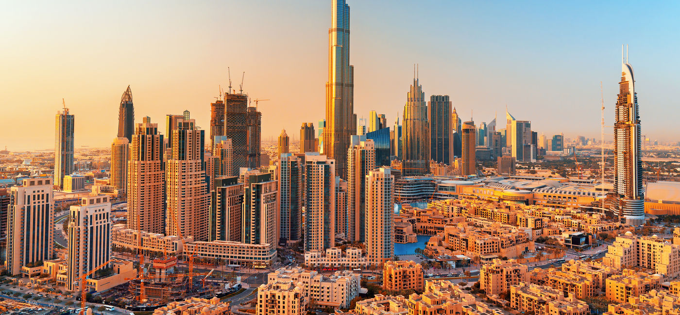 Image: Dubai downtown at the sunset (Photo Credit: Rastislav Sedlak SK/Adobe Stock)