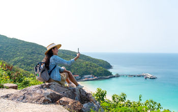 Traveler recording a video