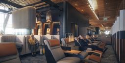 View of lounge chairs at Alaska Airlines' new lounge at PDX