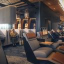 View of lounge chairs at Alaska Airlines' new lounge at PDX