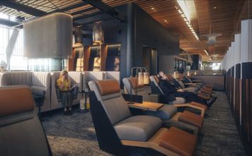 View of lounge chairs at Alaska Airlines' new lounge at PDX