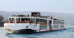 Viking longship sailing Europe's Rhine river.