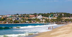 People on the beach in Puerto Escondido, Mexico