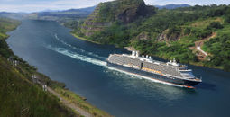 One of Holland America Line's ships sailing down the Panama Canal.