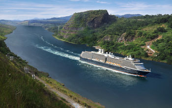 One of Holland America Line's ships sailing down the Panama Canal.