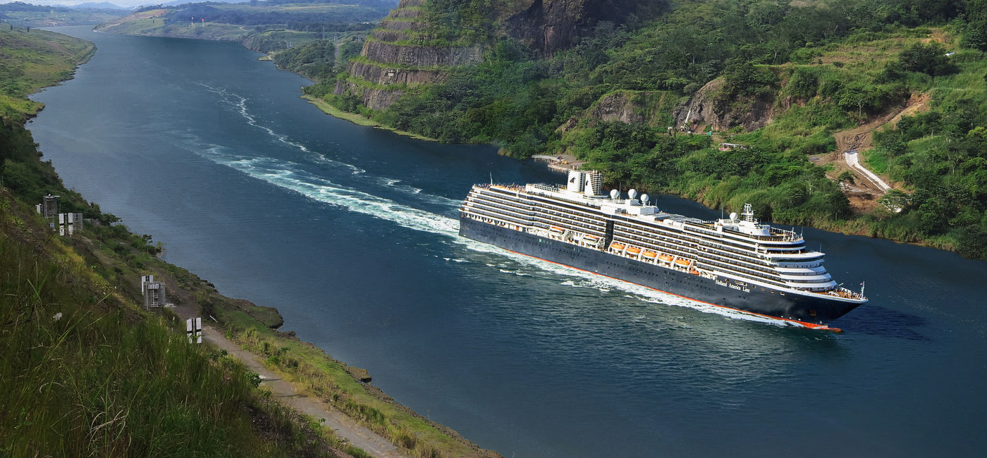 Image: One of Holland America Line's ships sailing down the Panama Canal. (Photo Credit: Holland America Line)