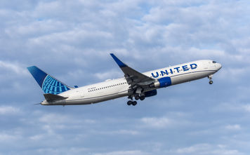 United Airlines airplane in flight.