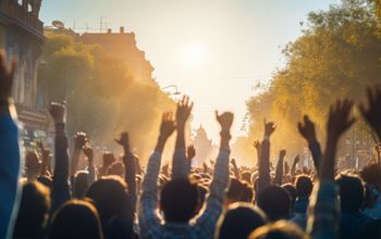 People rallying at a street protest.