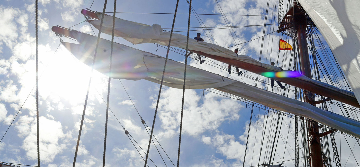 Image: The crew handle the rigging onboard the new Sea Cloud Spirit, a ship that defies modern sailing with three main masts and traditional sailing techniques. (Photo Credit: Sea Cloud Cruises)