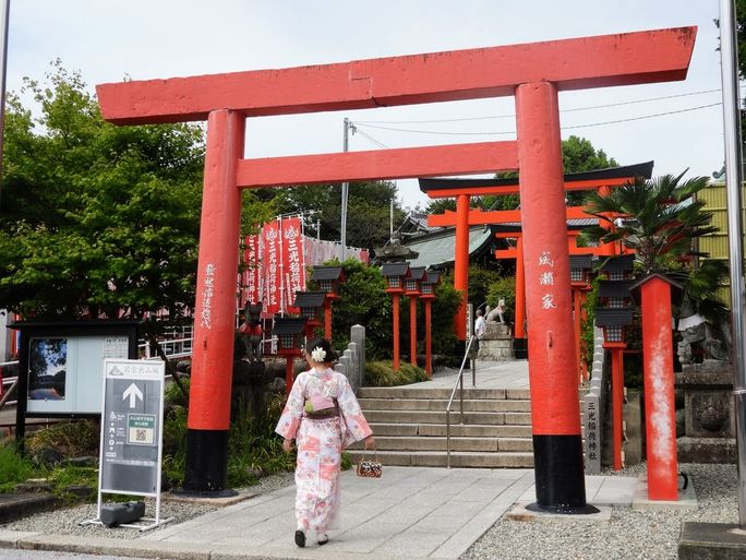 Red torii gates greet visitors to Inuyama Castle. Red torii gates greet visitors to Inuyama Castle.